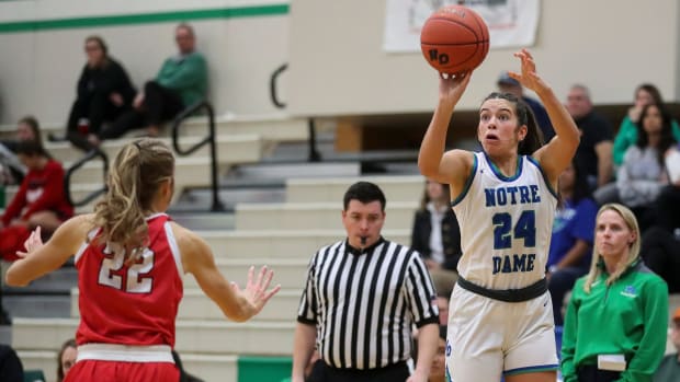 Notre Dame Academy's Gracie Grzesk (24) shoots a 3-pointer against Pulaski High School on Thursday, December 7, 2023, at Notre Dame in Green Bay, Wis. Notre Dame won the game, 57-17.